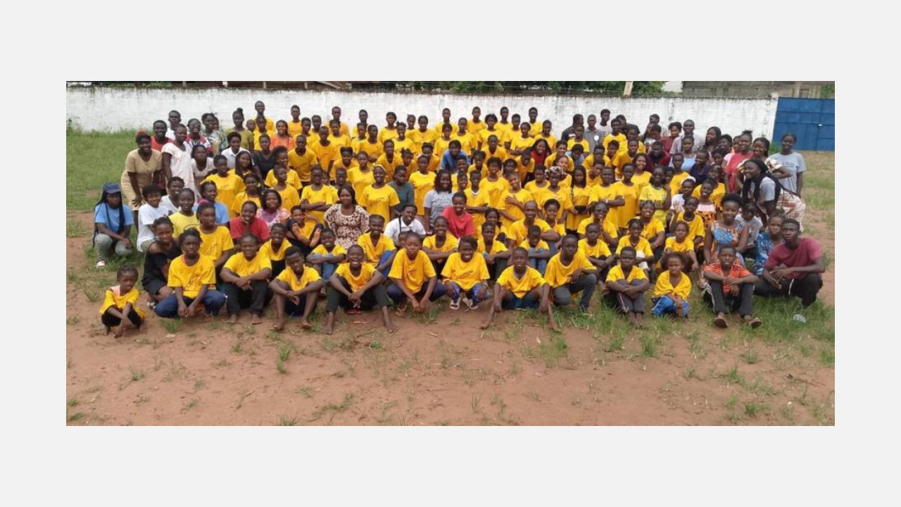 Group photo of children and youth served through the mission in Guinea Bissau